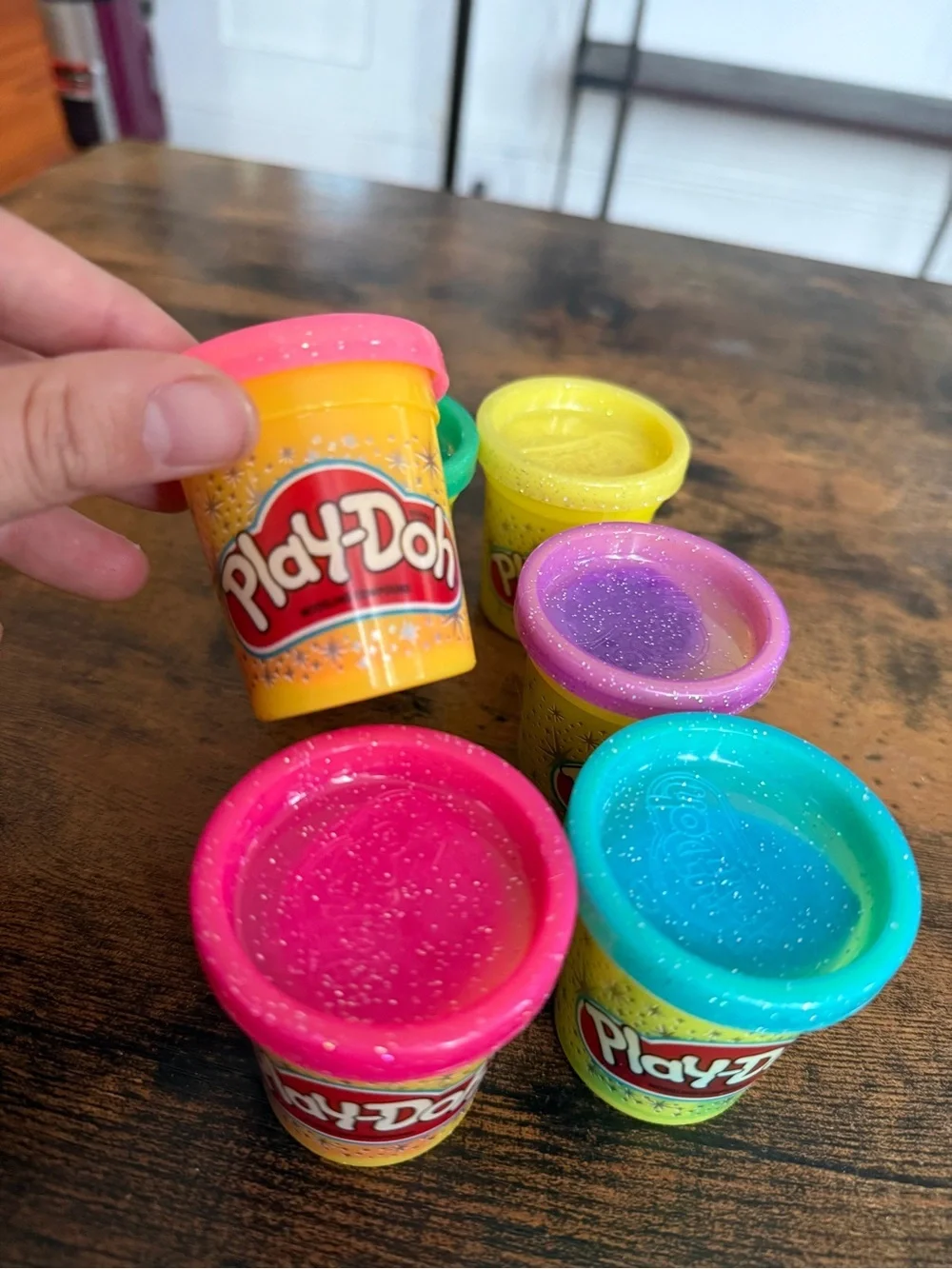 Play-Doh small Yellow with Pink, Teal, Purple, and Green Lids comes with all
